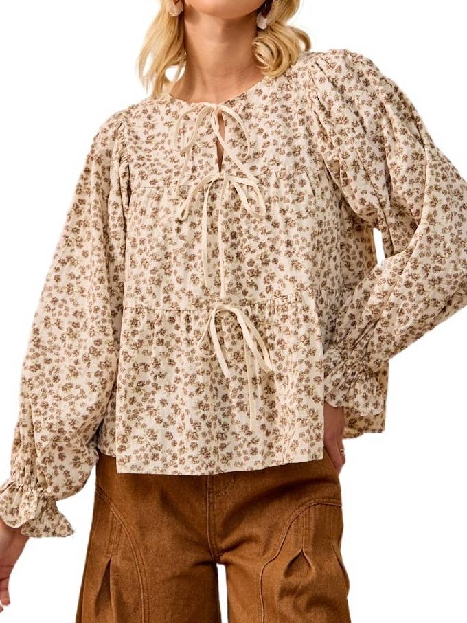 Floral Printed Peplum Top With Shirring And Tied and other Purchase Wholesale peplum. Free Returns & Net 60 Terms on Faire trending on Faire.