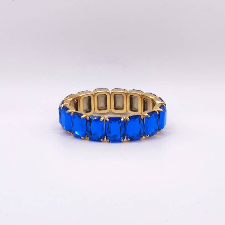 Elastiska Lux åttkantiga stenar armband - Capri Blue Otp för wholesale av QUÉ MÁS JEWELS