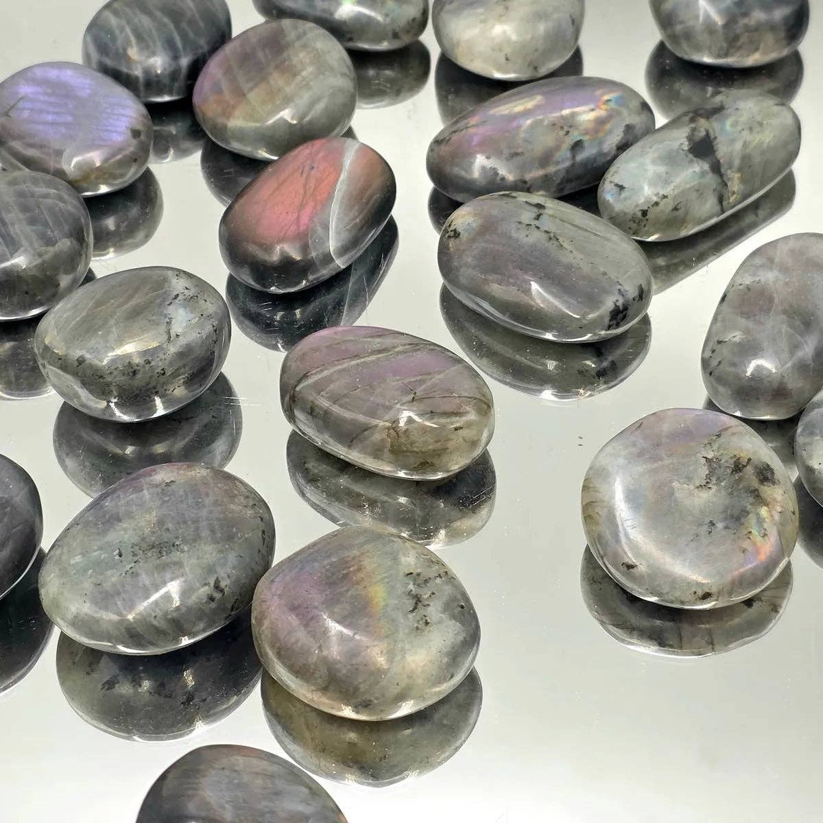 Distinction Crystals – wholesale Spiritual stone/crystal – Small Purple / Sunset Labradorite Crystal Palmstone1