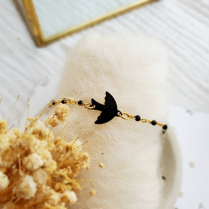 Sort armbånd med flyvende månefugl i rustfrit stål for engroshandel hos SoCuteWorld