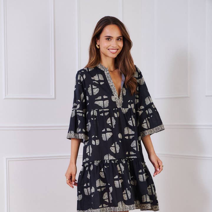 Short dress in batik print cotton - Orice and other Purchase Wholesale navajas. Free Returns & Net 60 Terms on Faire trending on Faire.