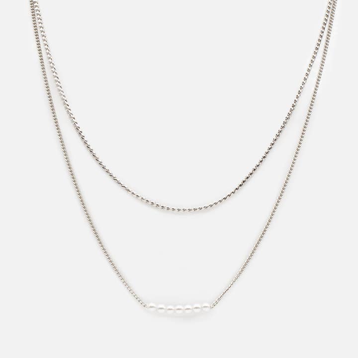 Set of two silvered necklaces with round pearl & "s" mesh - PL231N01AR pour la vente par Bizou