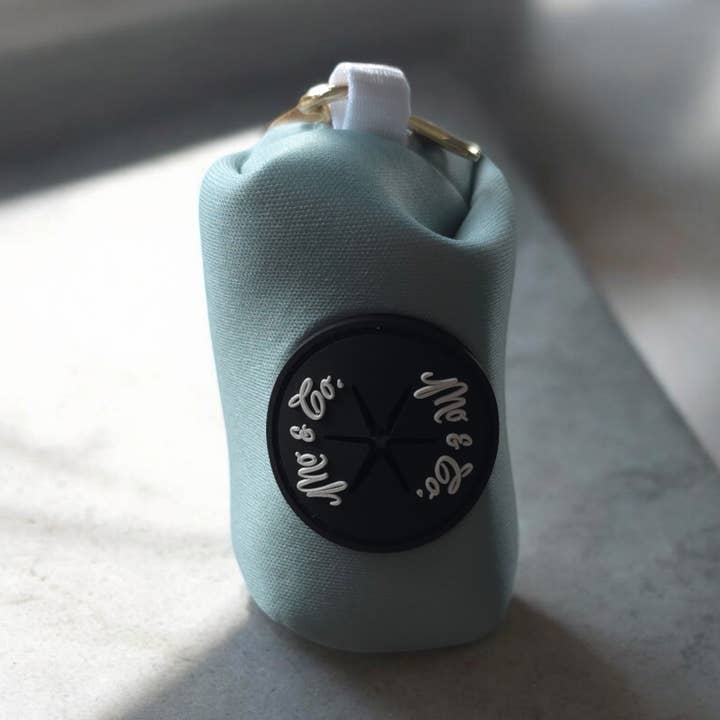 Mo & Co Neoprene Pet Waste Bag Dispenser for wholesale by Mo & Co.