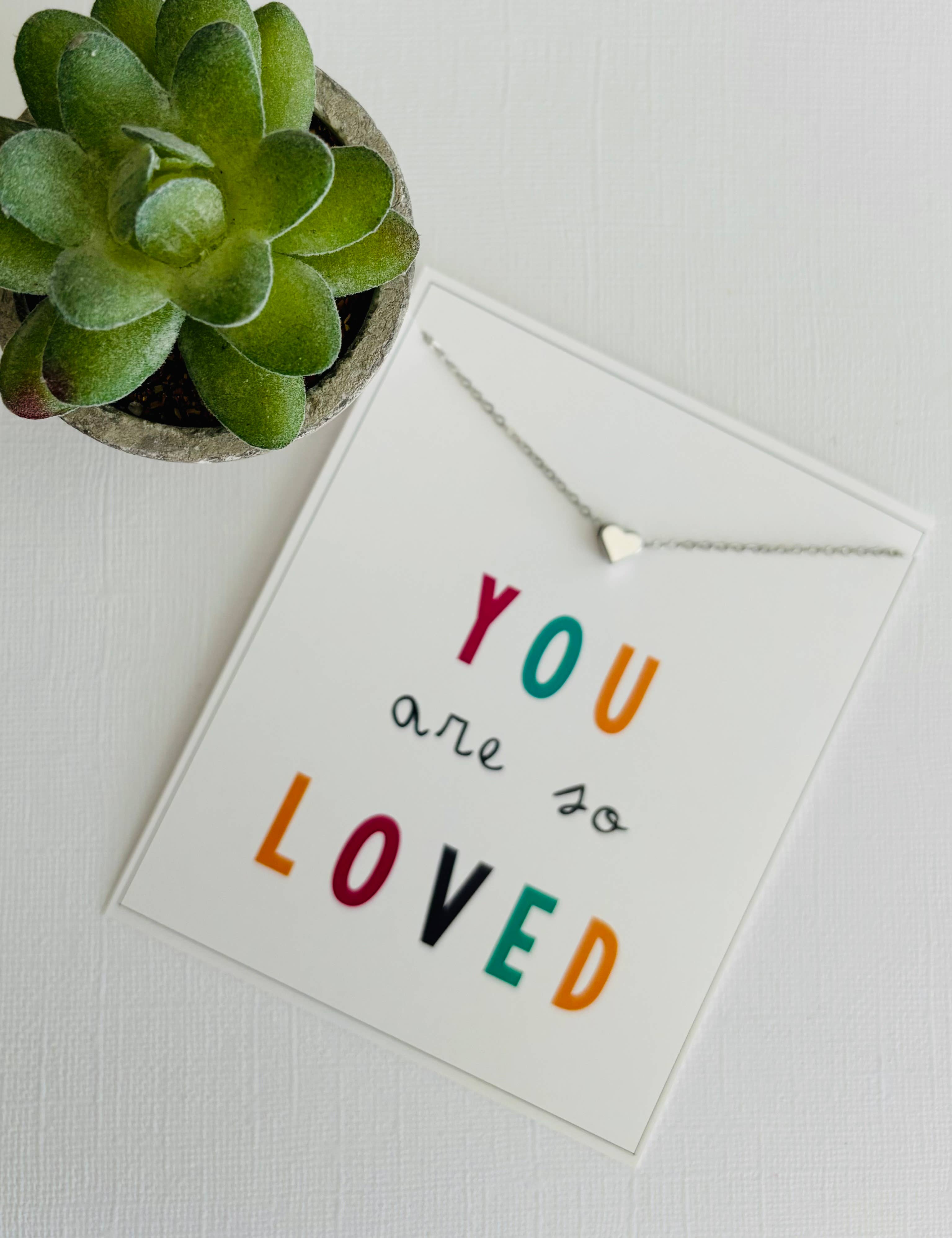 Peddle Your Paper - Vendita all'ingrosso Collana con ciondolo/pendaglio - Set regalo con collana a cuore in oro/argento e biglietto « YOU ARE LOVED »1