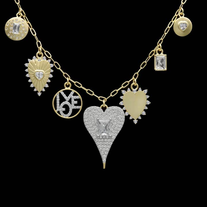 7 charm gold necklace with hearts and love charms for wholesale by Be Je Designs