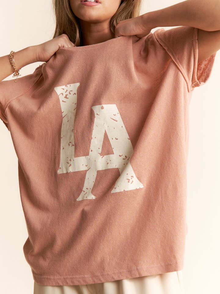 dust blush LA Logo Print Casual Short Sleeve Top for wholesale on Faire