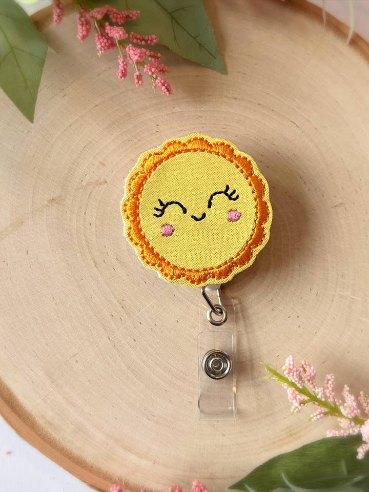 Happy Sun Retractable Badge Clip for Teachers & Nurses for wholesale by Meeko’s Must Haves