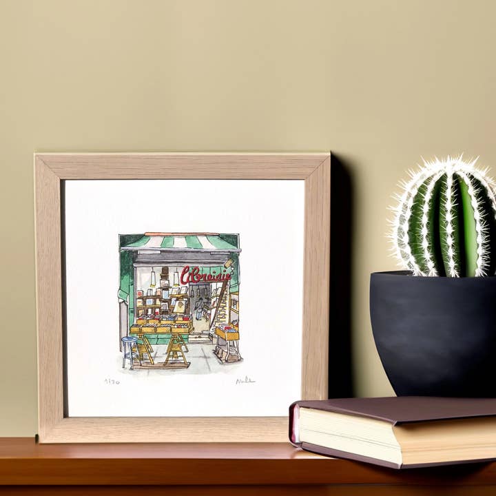 Akvarel: Boghandel, Paris, Frankrig (15x15 cm) for engroshandel hos Atelier Nunila