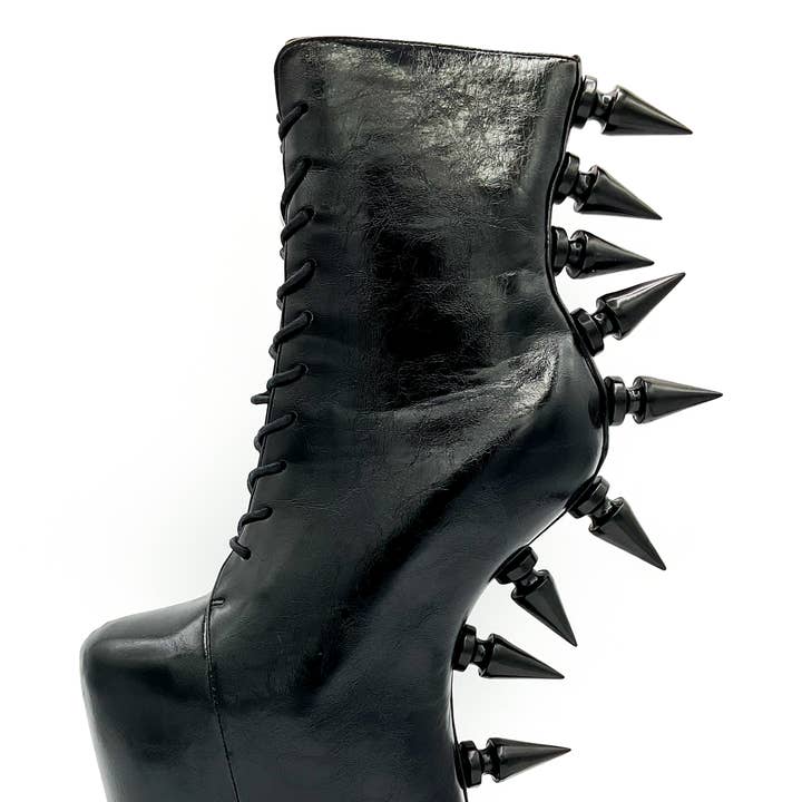 Prehistoric Patent Boot and other Purchase Wholesale 7 shoes. Free Returns & Net 60 Terms on Faire trending on Faire.