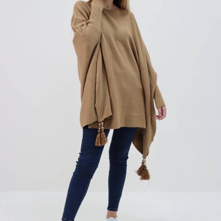 Italian Plain Batwing Sleeves Tassels Tunic Poncho and other Purchase Wholesale ponchos para mujer. Free Returns & Net 60 Terms on Faire trending on Faire.
