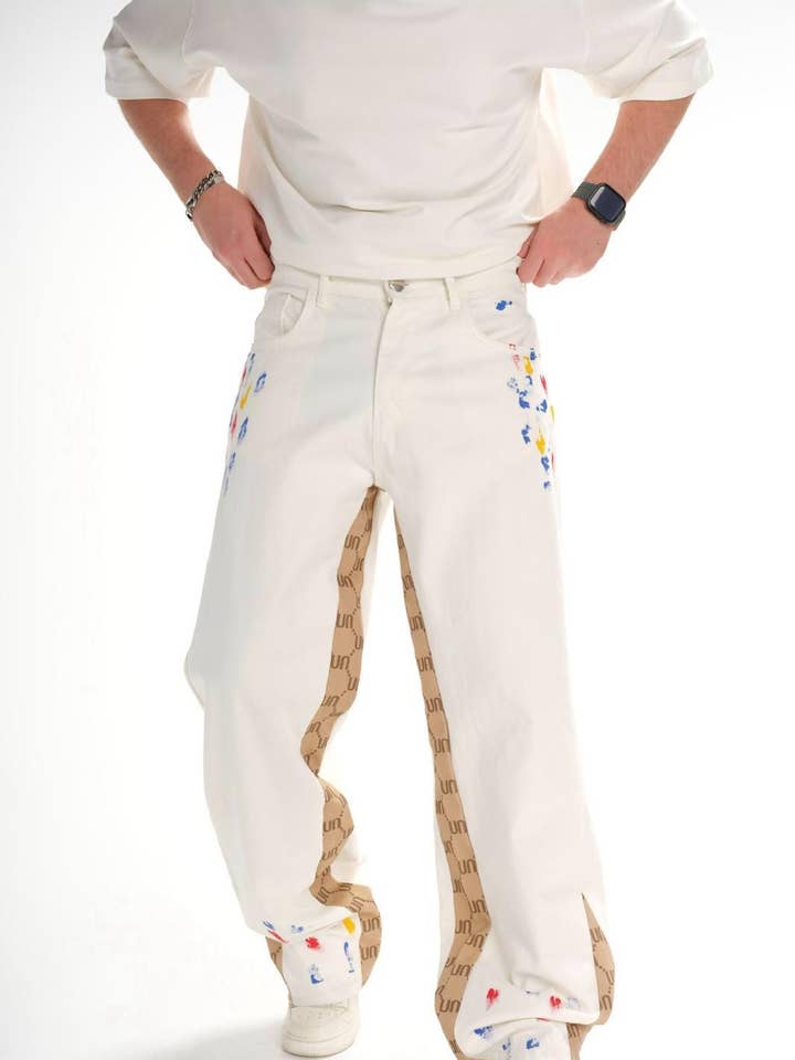 Herrvit breda jeans i denim med vit färgstänk och logopaneldetaljer 0924B9908 för wholesale av Monocloth