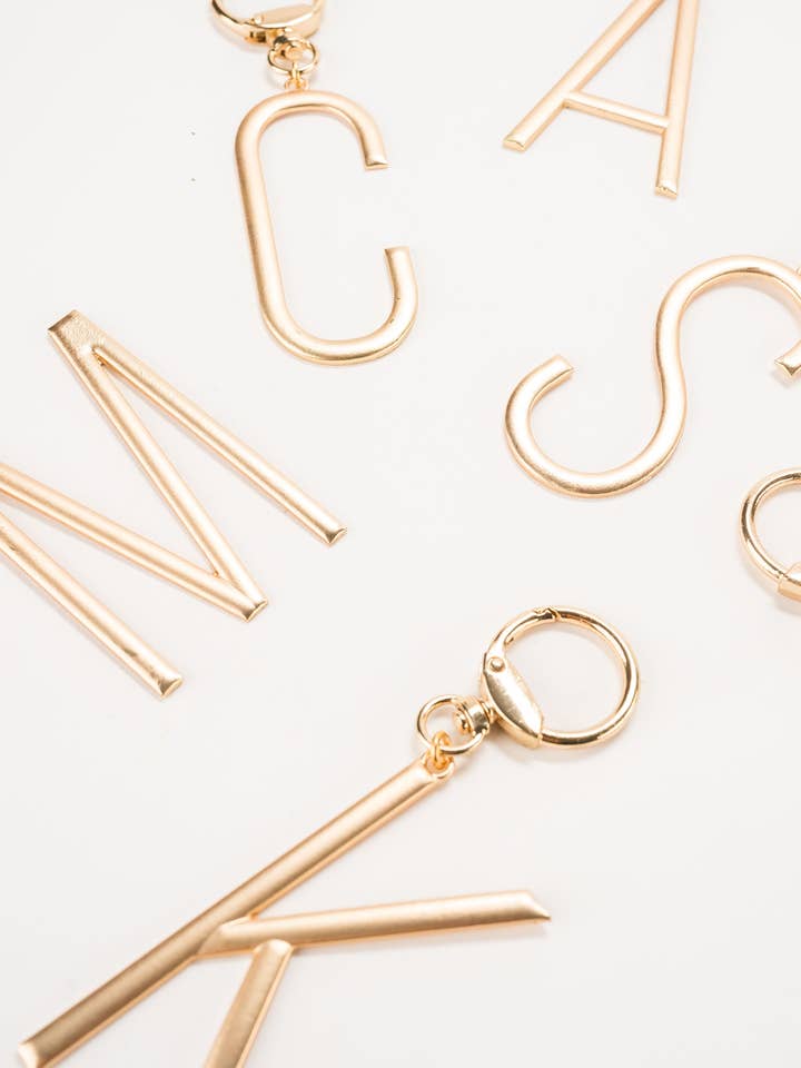 Gold Initial Bag Charm for wholesale by Violet & Brooks