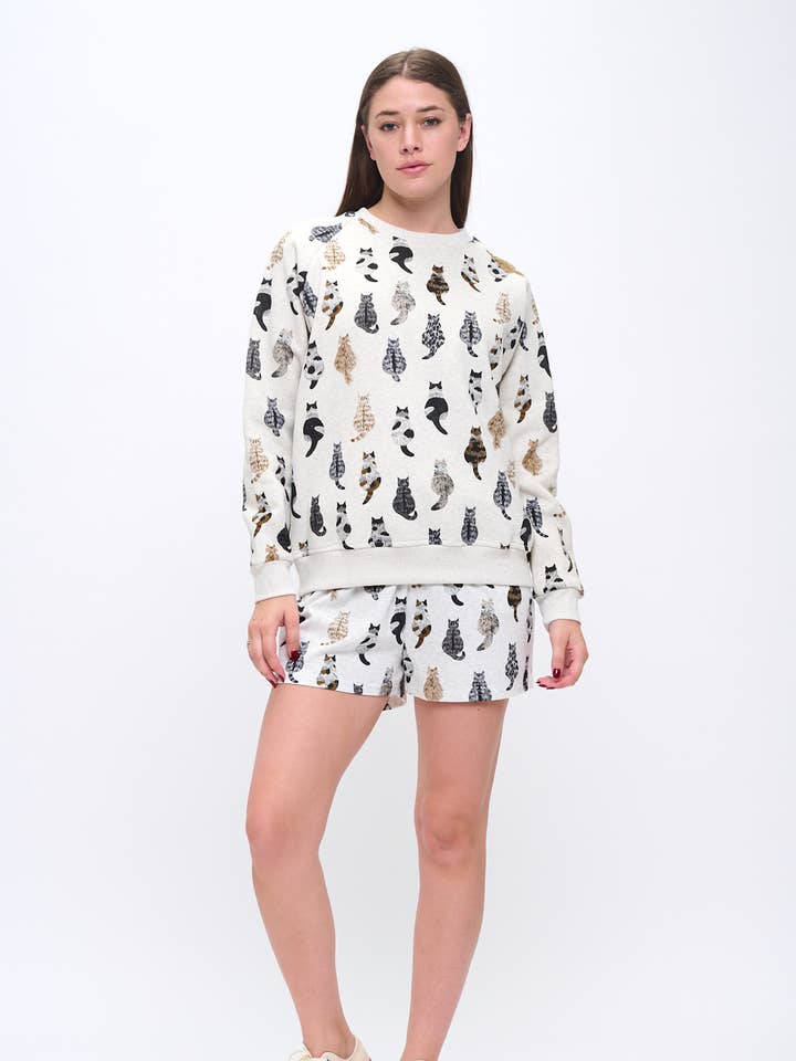 SWEATSHIRT MED TRYK AF LUNEFULDE KATTEHALER for engroshandel hos SM WARDROBE