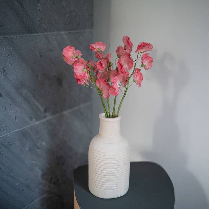 Sweet peas in dark pink paper. for wholesale by Flowrette