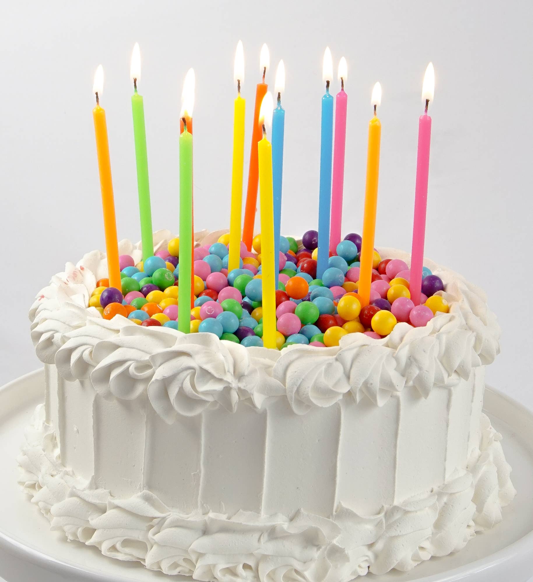 Party Partners - Vente Bougies pour gâteau - Ensemble de 12 bougies en dégradé arc-en-ciel fluo3