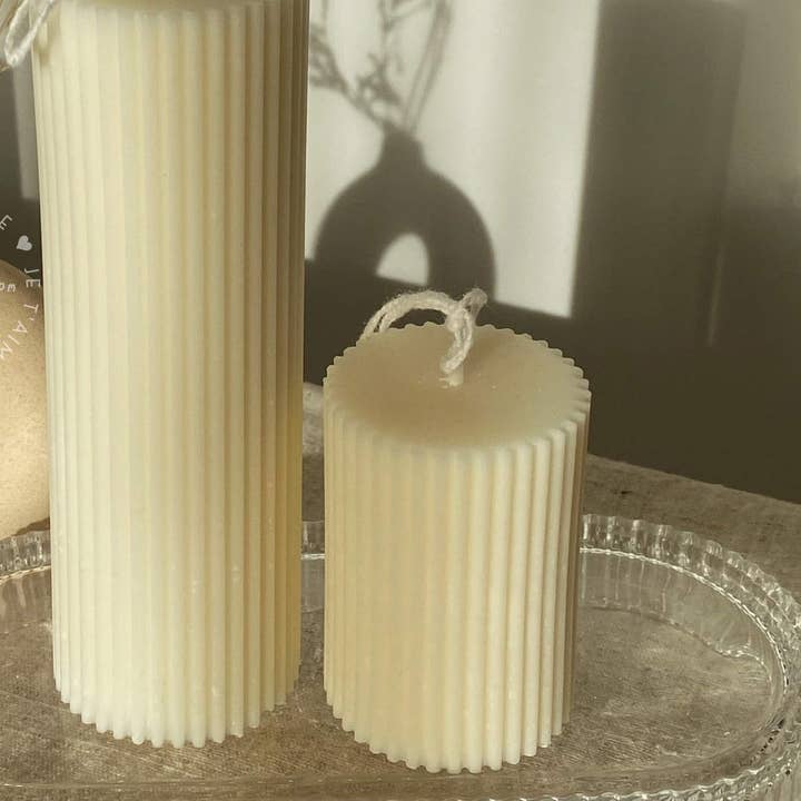 Small Scented Soy Ribbed Pillar Candle and other Purchase wholesale white unscented pillar candles. Free returns & net 60 terms on Faire trending on Faire.