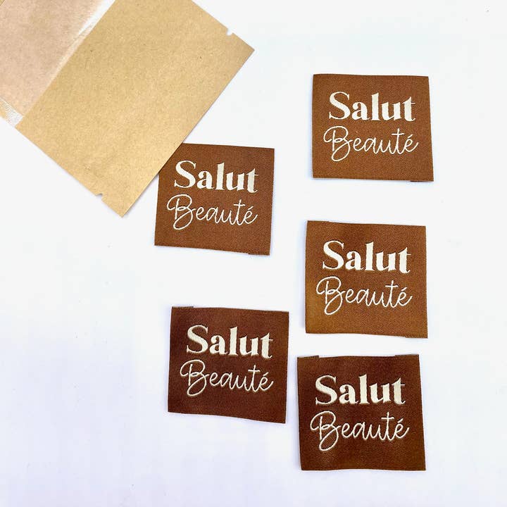 L’Étiquette Home Couture - Wholesale Craft Supplies - "Sew-on woven label 'HELLO BEAUTY' Camel"1
