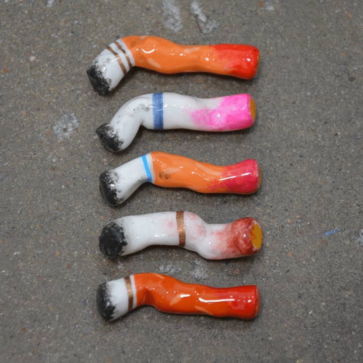 LIPSTICK STAINED CERAMIC CIGARETTES - SET OF FIVE and other Purchase Wholesale replicas. Free Returns & Net 60 Terms on Faire trending on Faire.