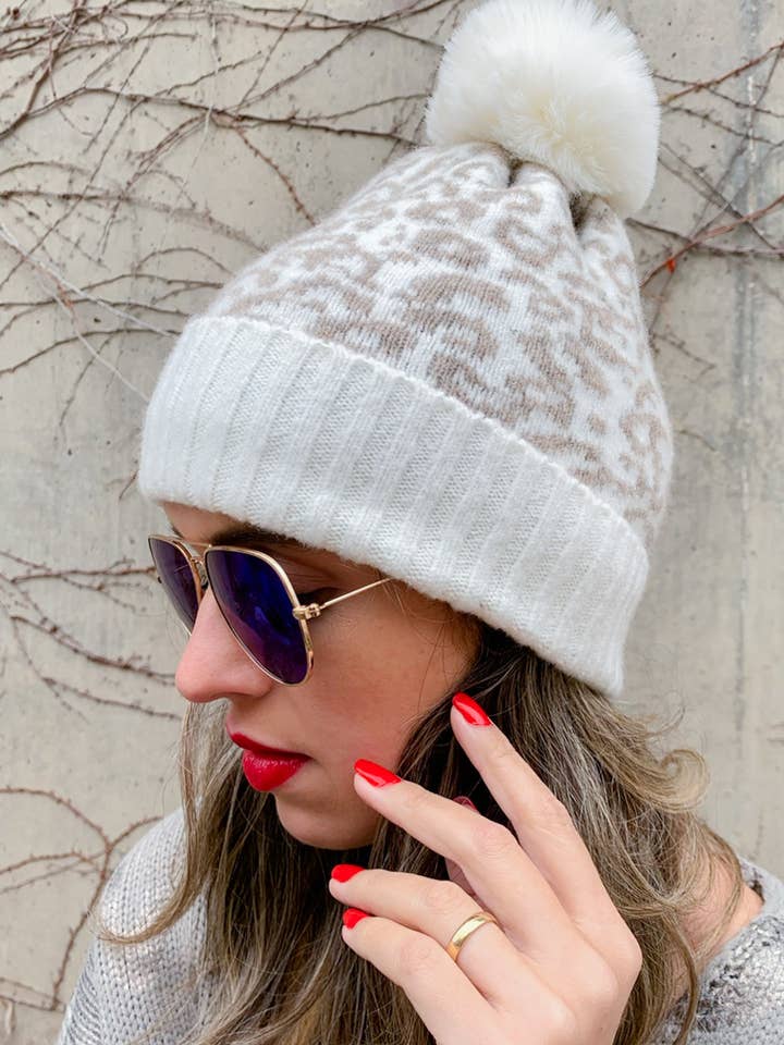 Ivory Leopard Printed Knitted Beanie With Pom Pom for wholesale by AMOLI