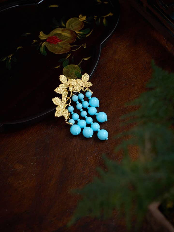 Drueklase Broche med Syntetisk Turkis & Guldbelægning for engroshandel hos Morado