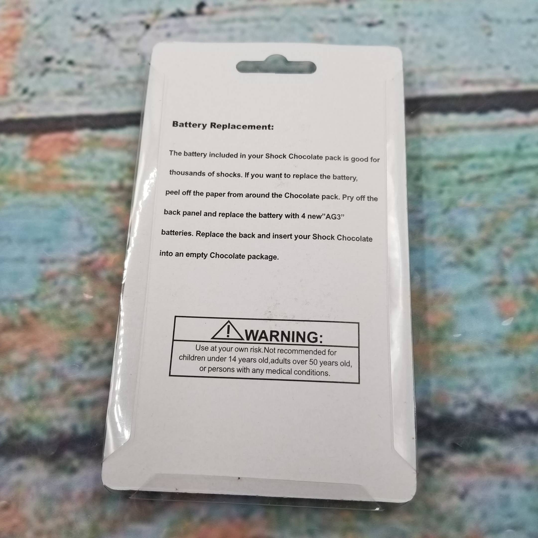 MIAS SHOP – wholesale Classic toy – Kids – Electric Shock Disguised Chocolate Pull Head Shocking Toy3