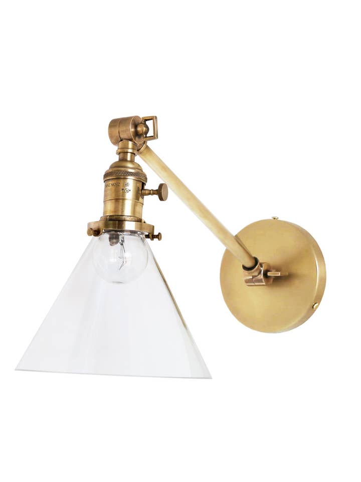 Jamestown Single Long Arm Wall Sconce with Tapered Clear Glass Shade, Antique Brass for wholesale by Fox Mill Lighting & Supply Co.