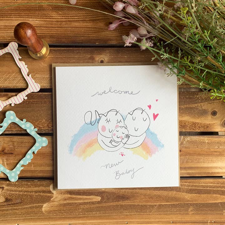 Welcome Baby ‘Hugs’ for wholesale by PaperTwigs Designs