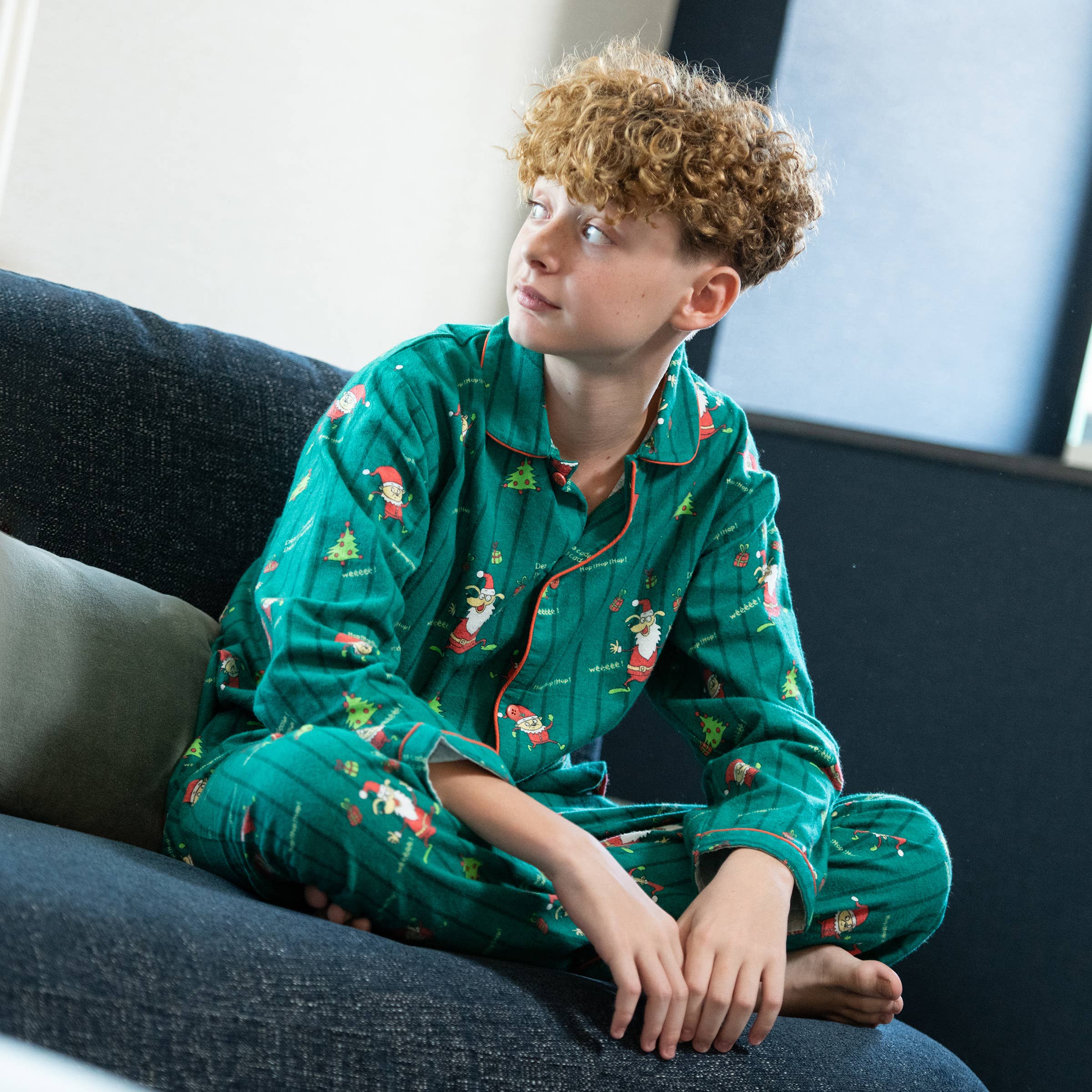 Green Children's flannel pajamas with Christmas elf print for wholesale on Faire4