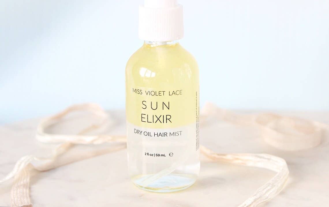 Wholesale Sun Elixir Dry Oil Hair Spray for your store Faire