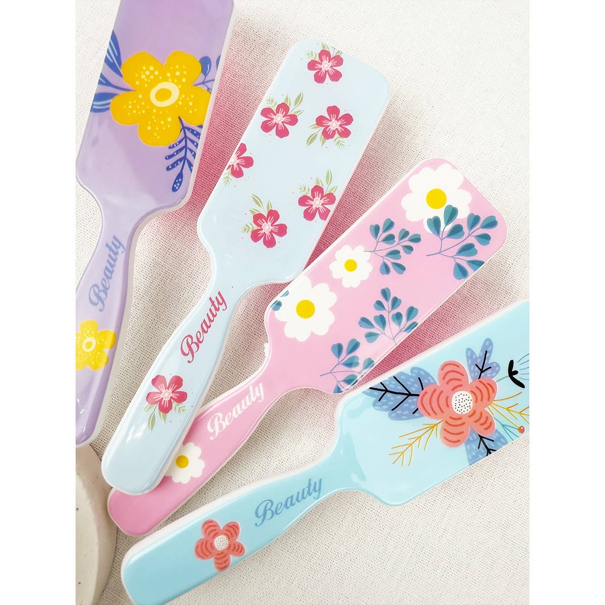 MÉLANGER LA COULEUR Brosse à cheveux rectangulaire à imprimé floral frais en vente sur Faire5