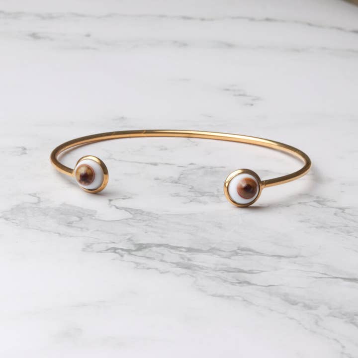 Eyes Golden Cuff Bracelet for wholesale by Sunset Yogurt