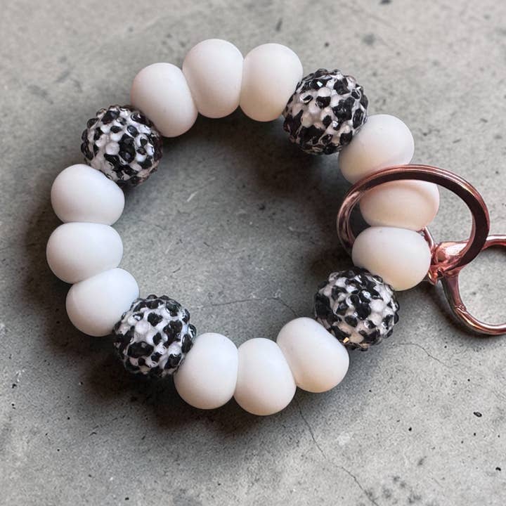 Cruella mellemstor nøglering for engroshandel hos Dream State by Christie