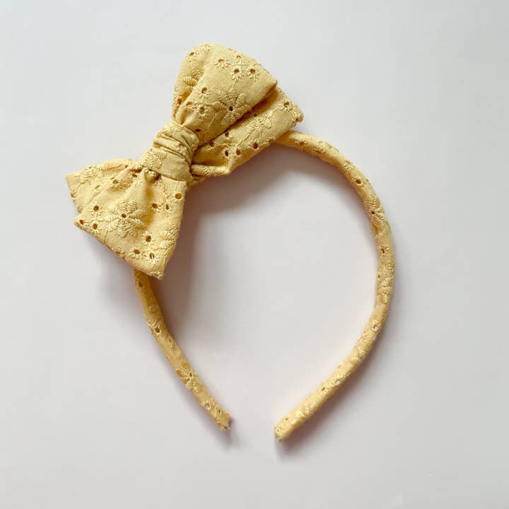 carrie hard bow headband for wholesale by Mai & I