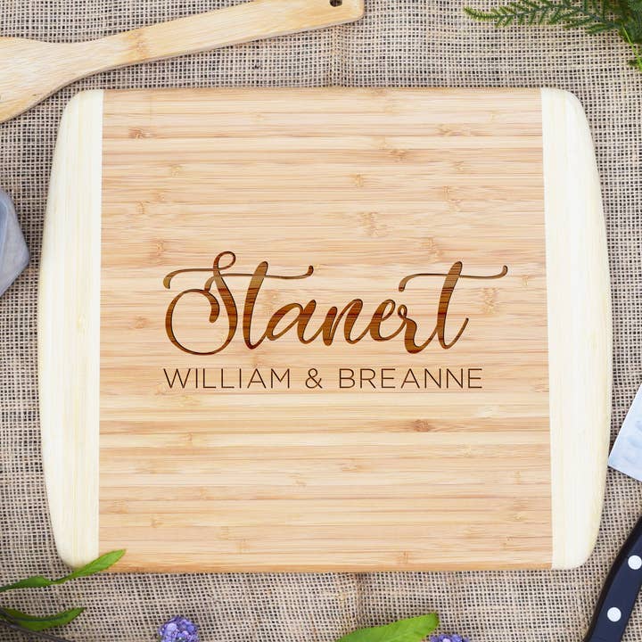 Last Name Script, First Names Two Tone Cutting Board for wholesale by Our Board Boutique