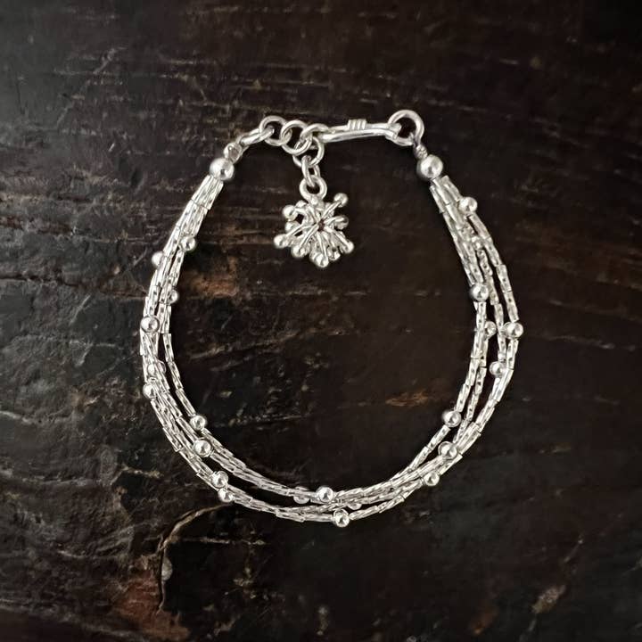 BB5 - Multistrand with dangling flower for wholesale by Anantara