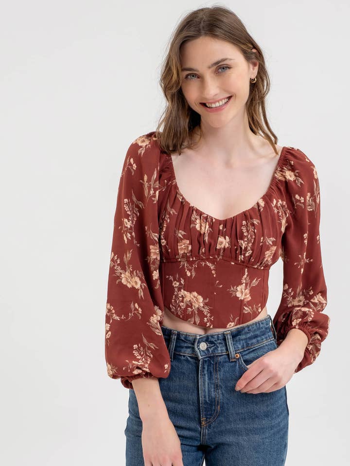 TOP CORTO CON CORSÉ FLORAL DE MANGA LARGA CON LAZO EN LA ESPALDA para venta al por mayor de Blu Pepper