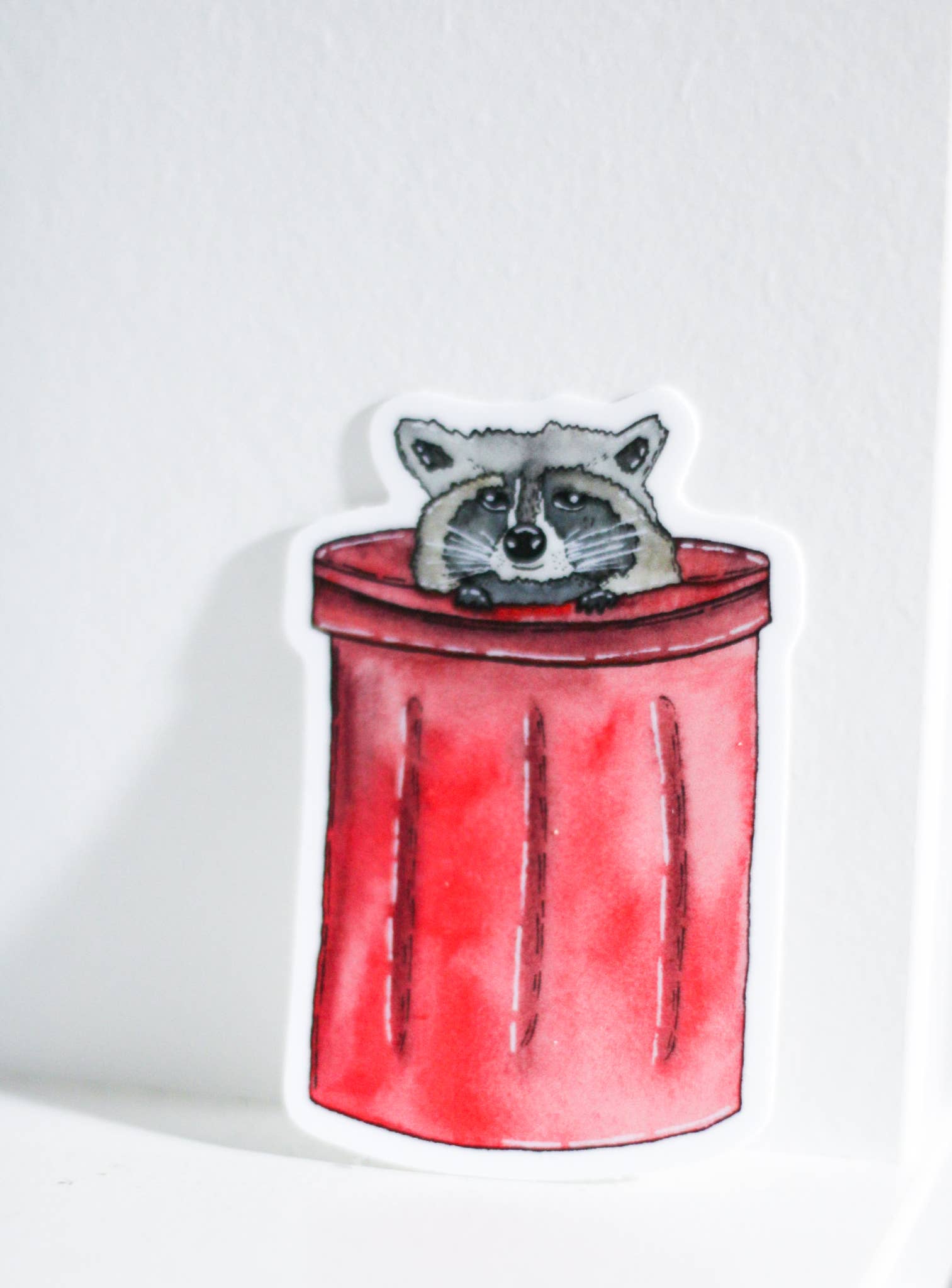 Raccoon in Trash Can | Trash Panda Watercolor Sticker for wholesale by Scribbles and Doodlez