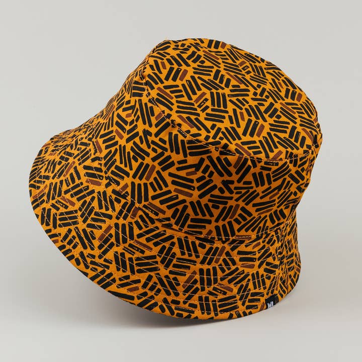 Brown Satin Lined Printed Bucket Hat in Umber for wholesale on Faire
