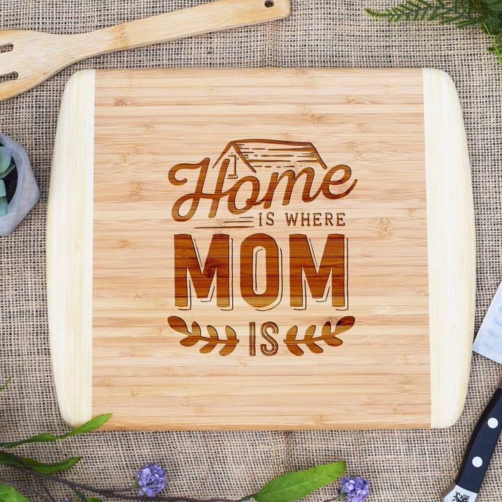 New Home Is Where Your Mom Is Two Tone Cutting Board for wholesale by Our Board Boutique