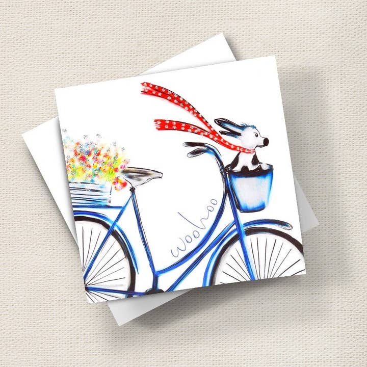 Chien sur un vélo pour la vente par English Graphics