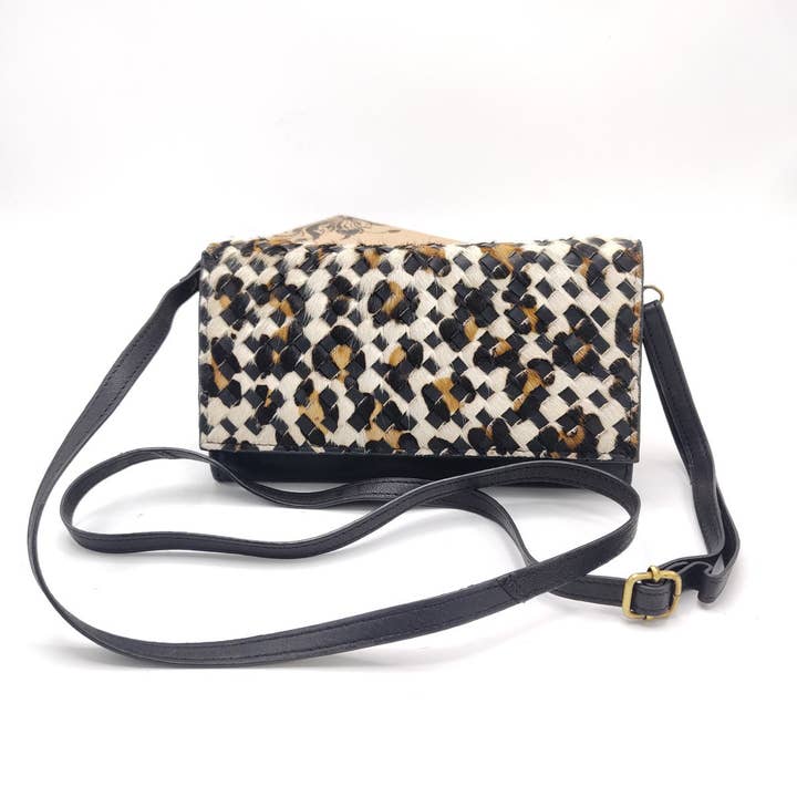 Washed leather and calf hair wallet art. LE057.422 for wholesale by Suie Valentini srl