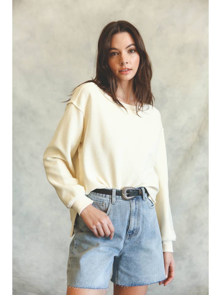 Cream Raw Edge Side Slit Sweatshirt for wholesale on Faire