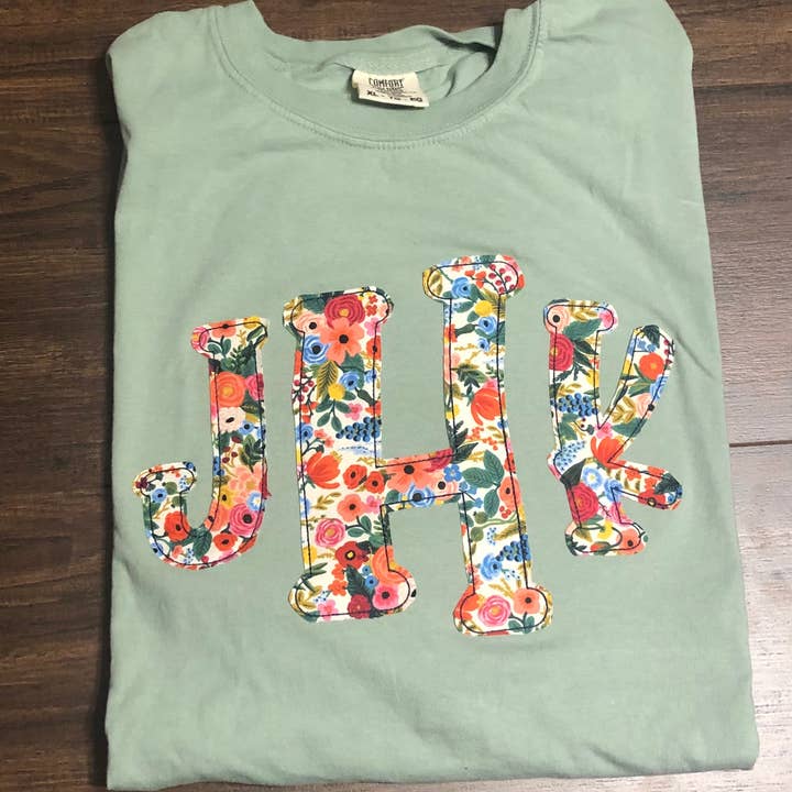 Cream Rifle Paper Co Floral Raggy Monogram Tee for wholesale by BLUE MAGNOLIA MONOGRAMS