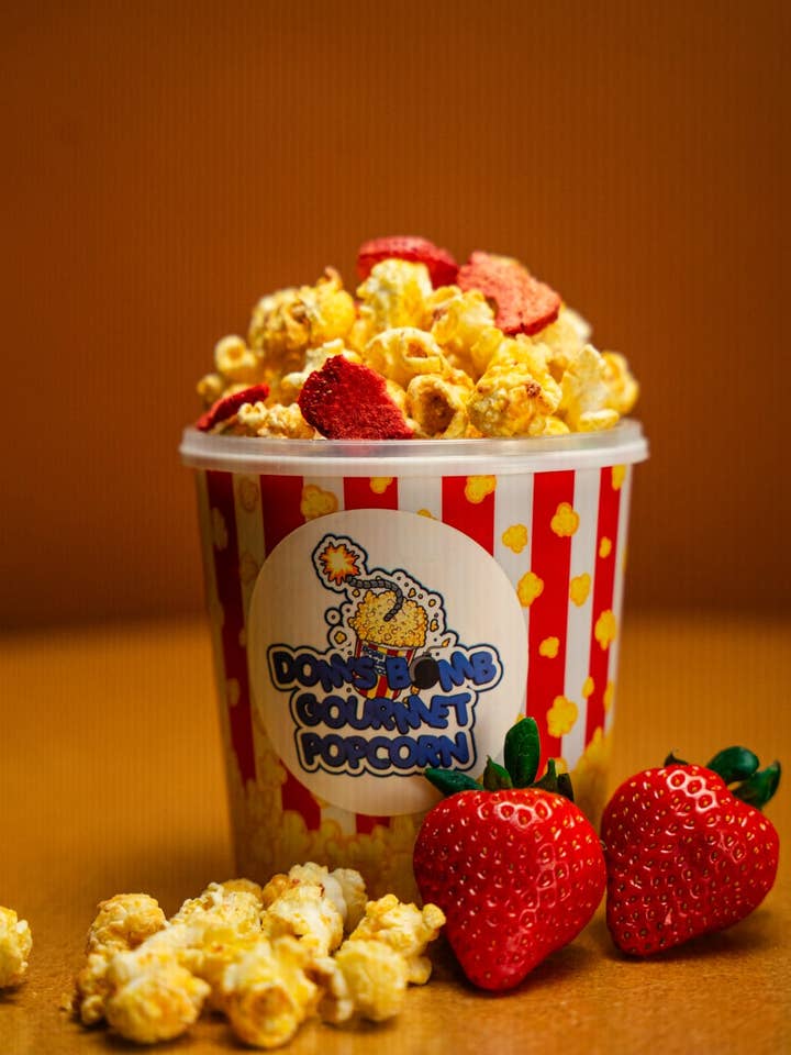 Strawberries and Cream for wholesale by Dom's Bomb Gourmet Popcorn LLC