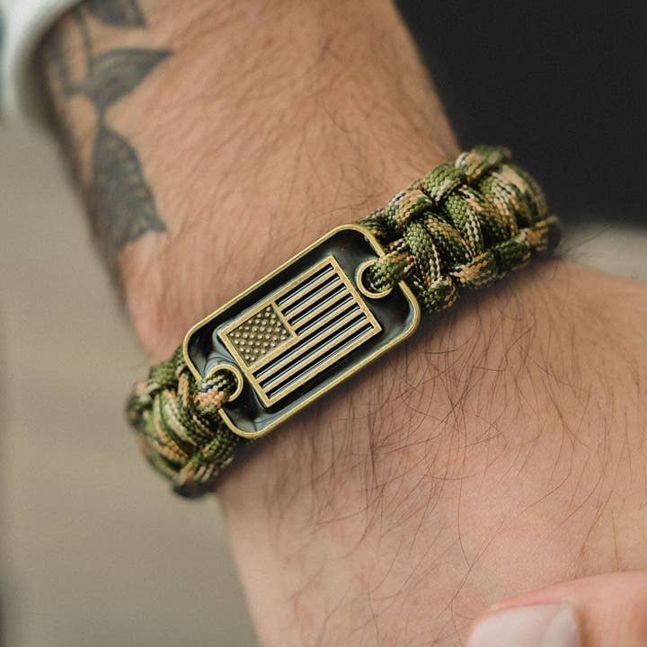 The Hero Company - Wholesale Woven/Braided Bracelet - The Hero Company-Camo Paracord Bronze Flag Bracelet- Helps Pair Veterans With A Companion Dog- Faire