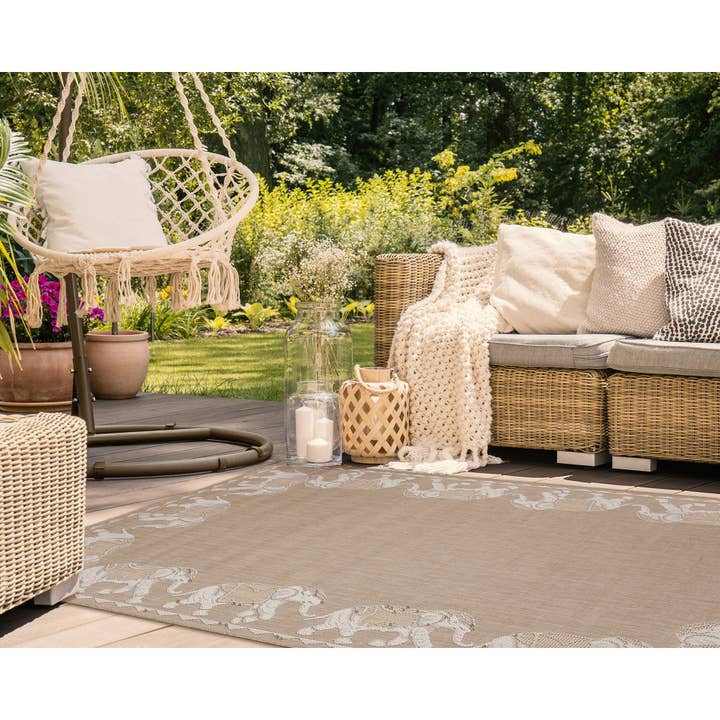 Carmel Marching Elephants Indoor/Outdoor Area Rug for wholesale by Liora Manne