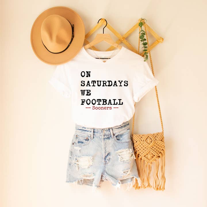 On Saturdays We Football - Custom Mascot Graphic T-Shirt for wholesale by The Southern Songbird Boutique