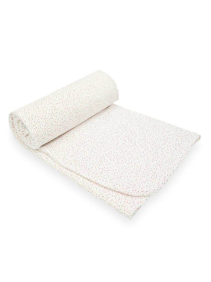 Cotton Velour Swaddle Tada with a pink polka dot print for wholesale by JAMIKS