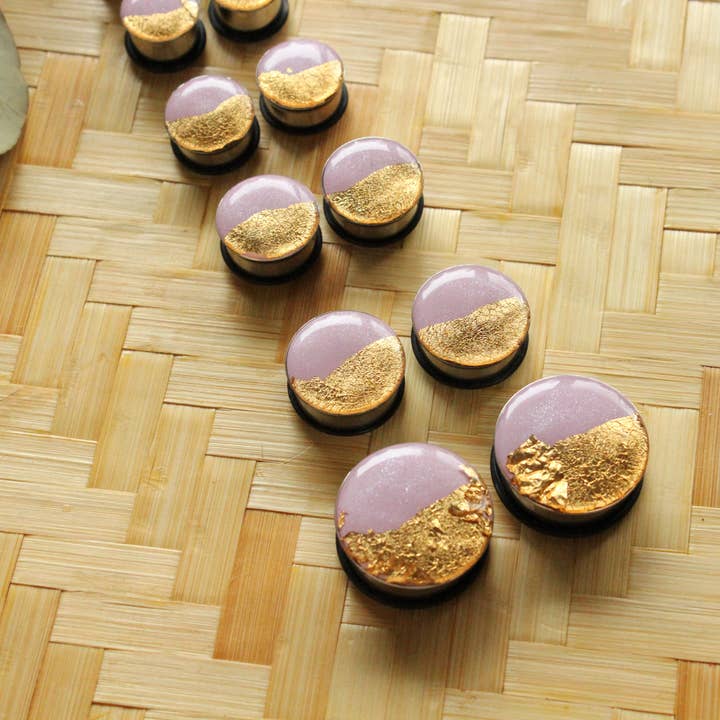 Gauges - Purple & Gold Flake Plugs for wholesale by The Watermark Design