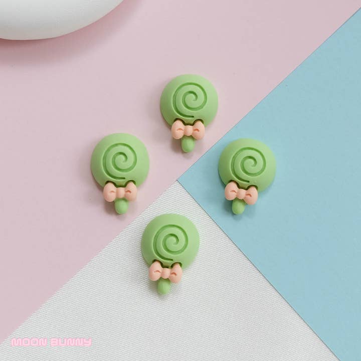 Random pcs Macaron Lollipops for wholesale on Faire2